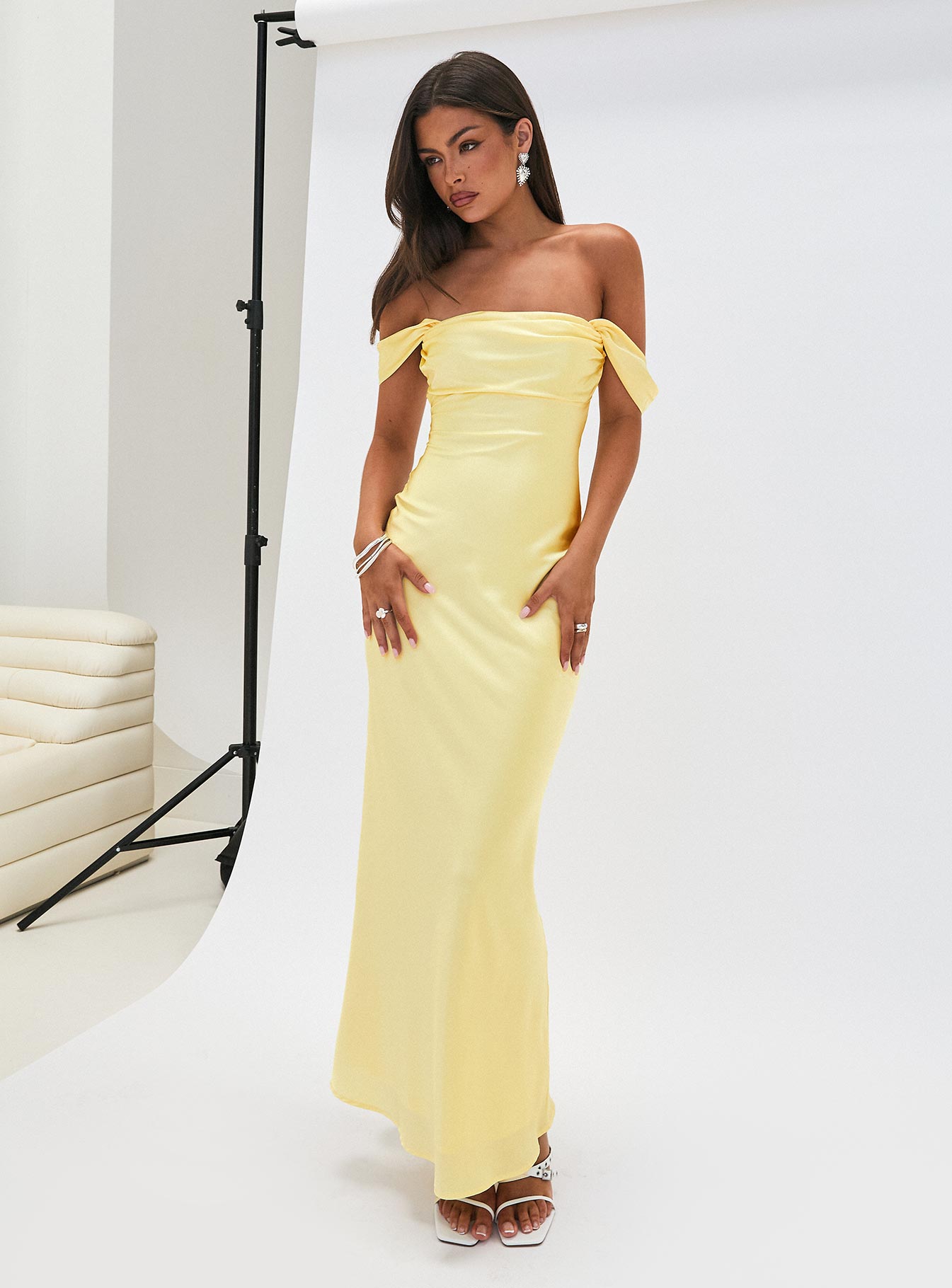side view of model wearing Princess Polly Azura Off The Shoulder Maxi Dress Yellow Straight Neck 